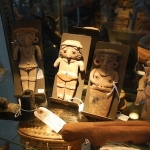 pre columbian figures with zuni stone mountain lion fetish